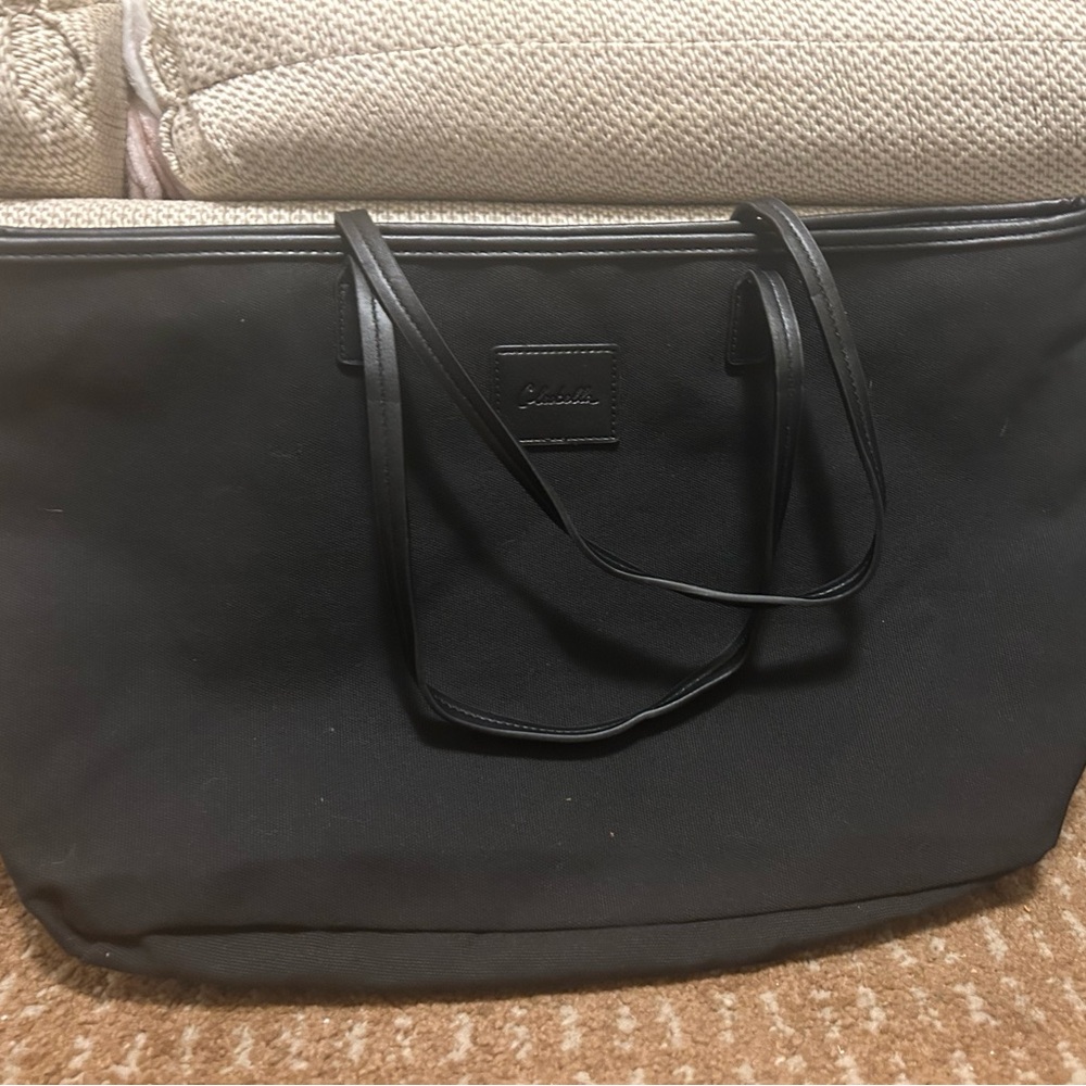 Cute canvas tote in like new shape. Zipper and all still in great shape